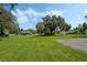 Picturesque lot featuring a lush lawn and mature trees, backing onto neighboring homes at 1669 Markel Dr, Winter Garden, FL 34787