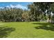 A beautifully maintained lot with mature trees providing ample shade and character at 1669 Markel Dr, Winter Garden, FL 34787