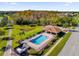 Community pool and cabana, showcasing a relaxing and upscale neighborhood amenity at 3211 Eagle Watch Dr, Kissimmee, FL 34746