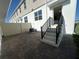 Brick patio with steps up to the house at 9332 Bolshoi Aly, Winter Garden, FL 34787