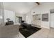 Bright living room with a fireplace, bar area, neutral colors, and sliding door to the outside at 11 Escondido Cir # 109, Altamonte Springs, FL 32701
