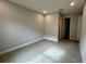 Spacious bedroom with tile flooring and private access to bathroom at 371 Lady Palm St, Apopka, FL 32703