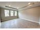 Bright and airy living room with tile floors and ample natural light at 371 Lady Palm St, Apopka, FL 32703
