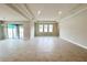 Open concept living area with tile floors and sliding glass doors at 371 Lady Palm St, Apopka, FL 32703