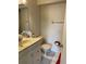 Cozy bathroom with a large vanity, sink, and essential fixtures at 6776 Brittany Chase Ct, Orlando, FL 32810