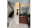 Modern kitchen with tile flooring, wood cabinets, and an eat-in area at 6776 Brittany Chase Ct, Orlando, FL 32810