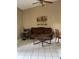 Cozy living room with modern furniture, neutral tones, and ample natural light at 6776 Brittany Chase Ct, Orlando, FL 32810