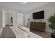 Spacious main bedroom with wood floors, modern decor, and ensuite bathroom access at 14304 Fredricksburg Dr # 420, Orlando, FL 32837