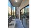 Balcony with seating area and view of surrounding resort and building at 14501 Grove Resort Ave # 1332, Winter Garden, FL 34787