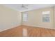 Spacious bedroom with wood floors and ceiling fan at 2871 Sandy Cay St, Clermont, FL 34711