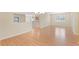 Open dining area with light wood laminate flooring at 2871 Sandy Cay St, Clermont, FL 34711