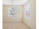 Bright dining room with light flooring and window blinds at 2871 Sandy Cay St, Clermont, FL 34711