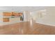 Open kitchen with light wood cabinets and stainless steel appliances at 2871 Sandy Cay St, Clermont, FL 34711
