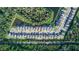 Stunning aerial view of a neighborhood featuring well-maintained homes and lush greenery at 5648 Green Arrow Pl, Sanford, FL 32773