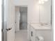 Bathroom featuring a single vanity, tile floors, neutral paint and modern fixtures at 5648 Green Arrow Pl, Sanford, FL 32773