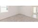 Cozy bedroom with neutral walls, carpet flooring, and a closet at 5648 Green Arrow Pl, Sanford, FL 32773