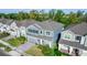 Beautiful two-story home boasting a well-manicured lawn, gray roof, and desirable neighborhood at 5648 Green Arrow Pl, Sanford, FL 32773