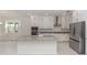 Beautiful kitchen with stainless steel appliances, granite countertops, and a center island at 5648 Green Arrow Pl, Sanford, FL 32773