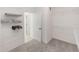 Walk-in Closet includes wire shelving and neutral carpet at 5648 Green Arrow Pl, Sanford, FL 32773