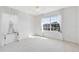 Bright bedroom with large window, neutral carpet, and sheer white curtains at 2815 Crane Trace Cir, Orlando, FL 32837