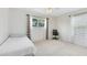 Bedroom with twin bed, desk chair, and two windows for natural light at 2815 Crane Trace Cir, Orlando, FL 32837