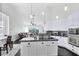 Modern kitchen with an island, stainless steel appliances, open to the living area at 2815 Crane Trace Cir, Orlando, FL 32837
