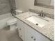 Bathroom boasts granite vanity and updated fixtures at 6921 Central Ave, Mulberry, FL 33860