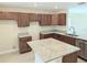 Modern kitchen with granite countertops and ample cabinetry at 6921 Central Ave, Mulberry, FL 33860