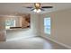 Open living room, features a view into the kitchen at 6921 Central Ave, Mulberry, FL 33860