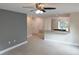 Bright living room with ceiling fan and open concept design at 6921 Central Ave, Mulberry, FL 33860