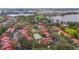 Aerial view of condo community near a lake at 11574 Westwood Blvd # 1112, Orlando, FL 32821