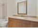 Bathroom with granite vanity and tiled shower/tub at 11574 Westwood Blvd # 1112, Orlando, FL 32821