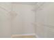 Spacious walk-in closet with wire shelving at 11574 Westwood Blvd # 1112, Orlando, FL 32821