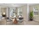 Dining area with round table and four chairs at 11574 Westwood Blvd # 1112, Orlando, FL 32821