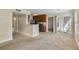 Open kitchen with breakfast bar and access to patio at 11574 Westwood Blvd # 1112, Orlando, FL 32821