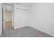 Spacious bedroom with double door closet and gray carpet at 16387 Happy Eagle Dr, Clermont, FL 34714
