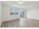 Living room with sliding glass doors leading to backyard at 16387 Happy Eagle Dr, Clermont, FL 34714