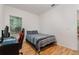 This cozy bedroom has a window for natural light and a computer desk at 1989 Marsh Hen Vlg, Deland, FL 32720