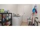 This laundry room has a new washer and dryer, and plenty of storage space at 1989 Marsh Hen Vlg, Deland, FL 32720