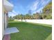 House with a fenced backyard and patio at 2582 Glacier Express Ln, Tavares, FL 32778