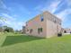 Two story house with a large backyard at 2582 Glacier Express Ln, Tavares, FL 32778