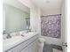 Clean bathroom with double sinks and shower/tub combo at 2582 Glacier Express Ln, Tavares, FL 32778