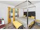 Bedroom with a king-size bed and a canopy at 2582 Glacier Express Ln, Tavares, FL 32778
