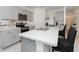 Modern kitchen with stainless steel appliances and an island at 2582 Glacier Express Ln, Tavares, FL 32778
