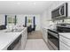 Modern kitchen featuring stainless steel appliances and an island at 2582 Glacier Express Ln, Tavares, FL 32778