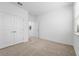 Bedroom with double doors and window at 340 Belmond Dr, Debary, FL 32713