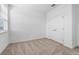 Spacious bedroom with double doors and window at 340 Belmond Dr, Debary, FL 32713