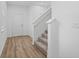 Bright entryway with stairs and light wood flooring at 340 Belmond Dr, Debary, FL 32713
