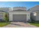 Attached garage with paver driveway at 340 Belmond Dr, Debary, FL 32713