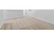 Upstairs hallway with neutral carpet and walls at 340 Belmond Dr, Debary, FL 32713